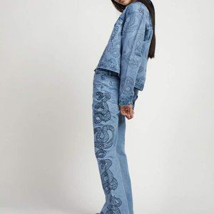 Milk It flared snake print denim